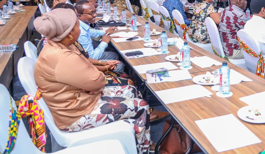 Delegates seated along a conference table